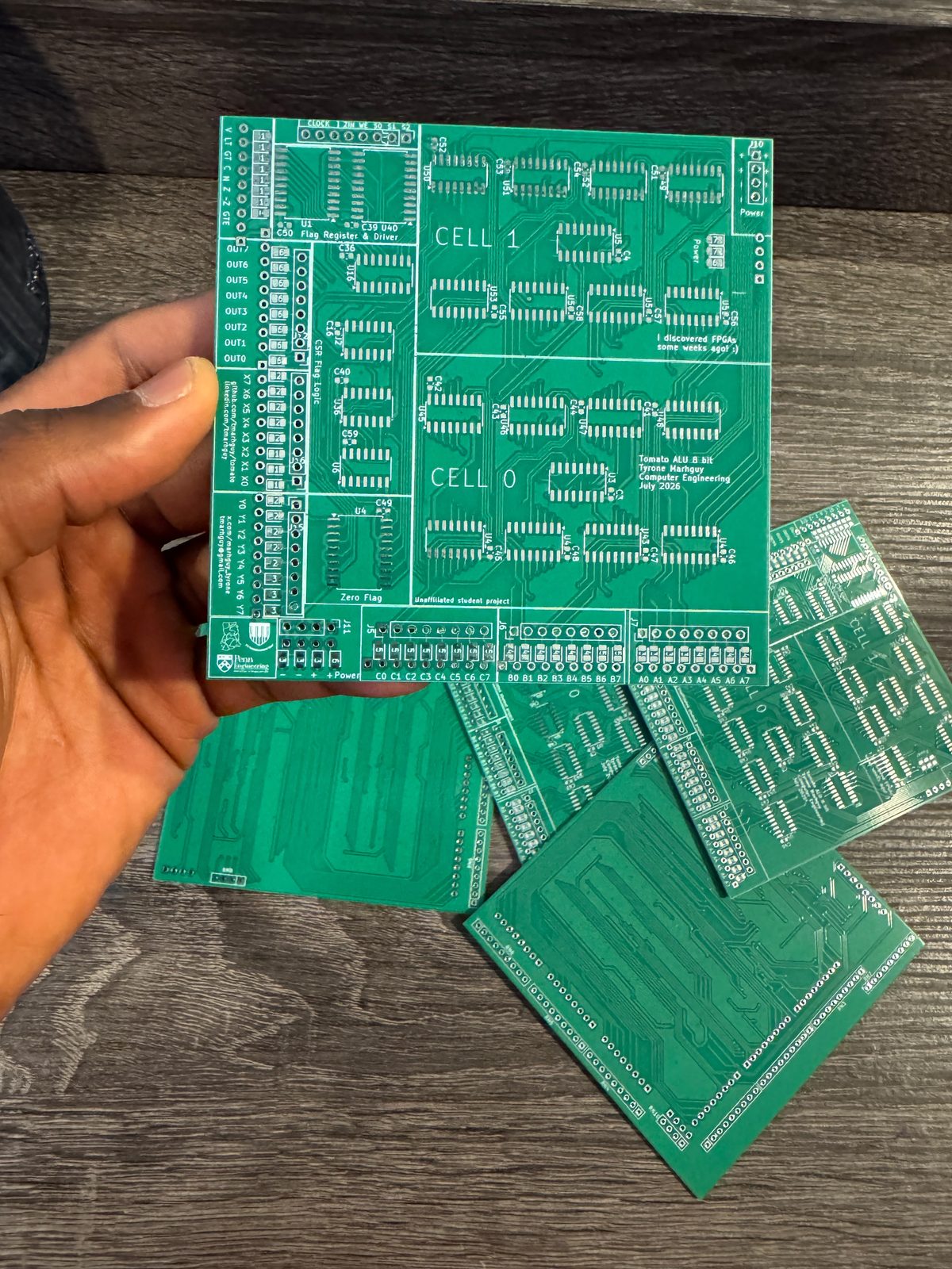 Five 07_alu boards on the desk — Tomato ALU 8 bit, July 2026.