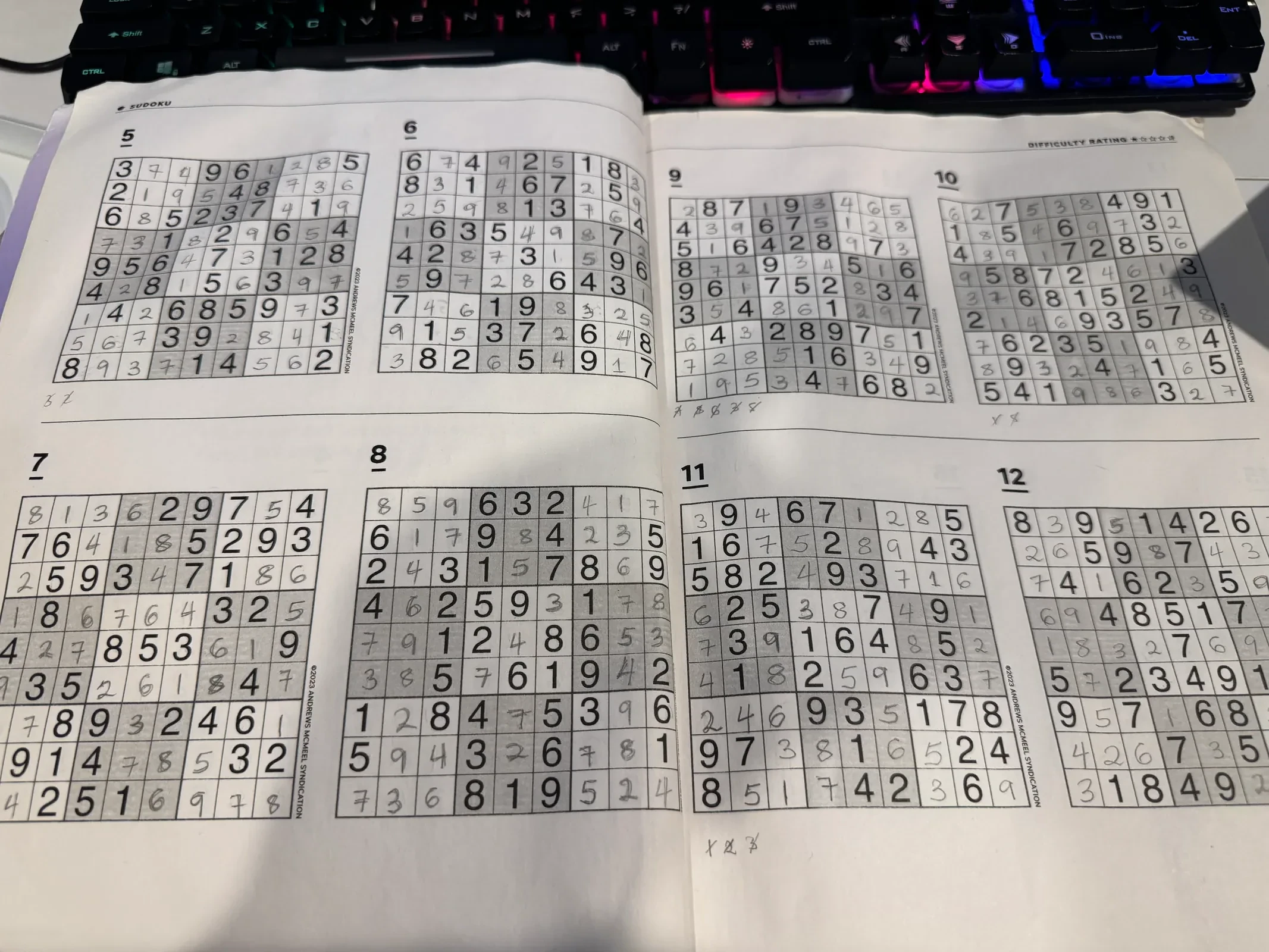 Solved Sudoku page from the same book